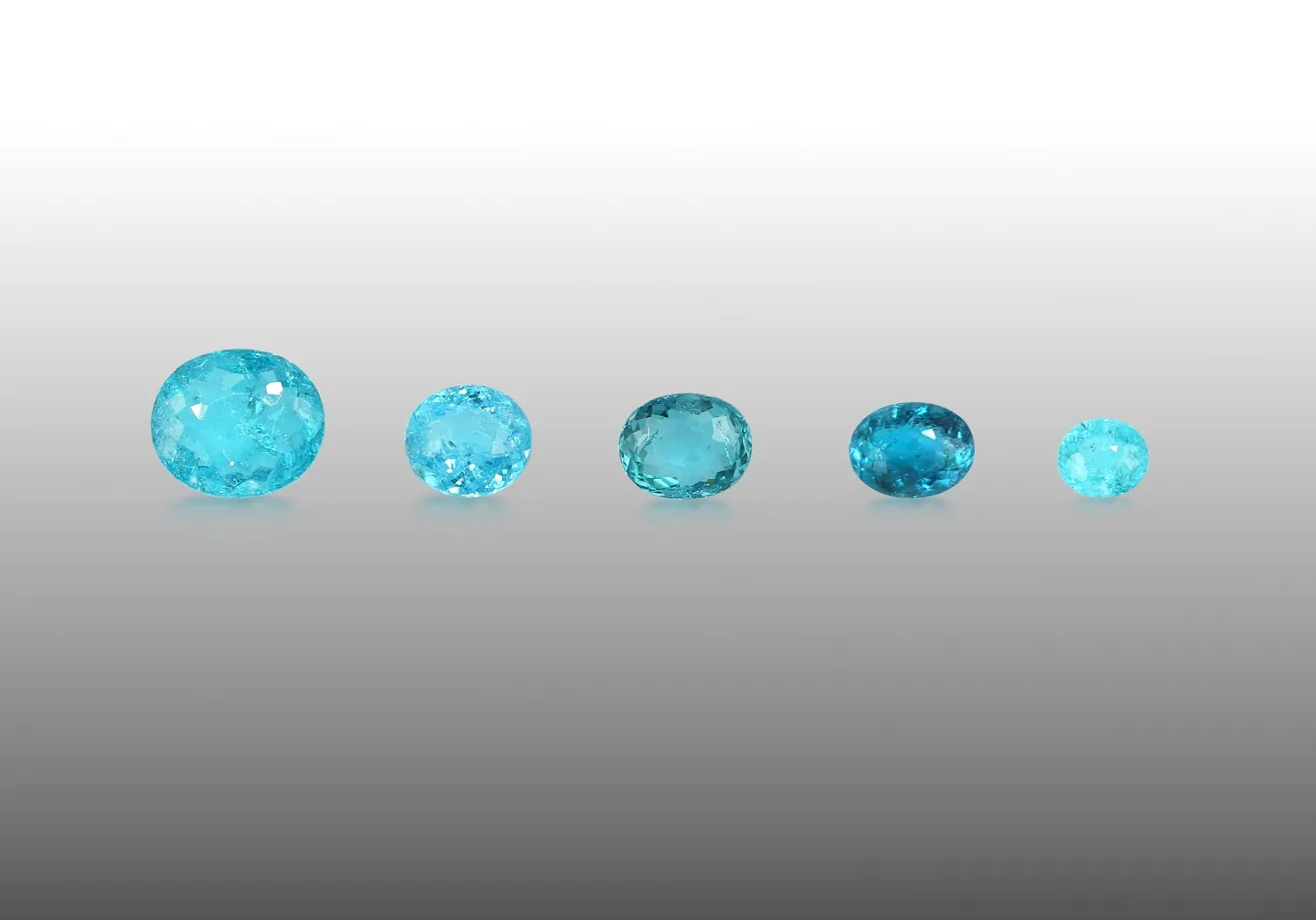 Five faceted blue and blue-green Paraíba tourmalines from Abuloo, Ethiopia, weighing 0.45 to 2.10 ct.